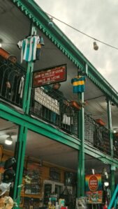 Vibrant scene at San Telmo Market in Buenos Aires with colorful facades and local culture.